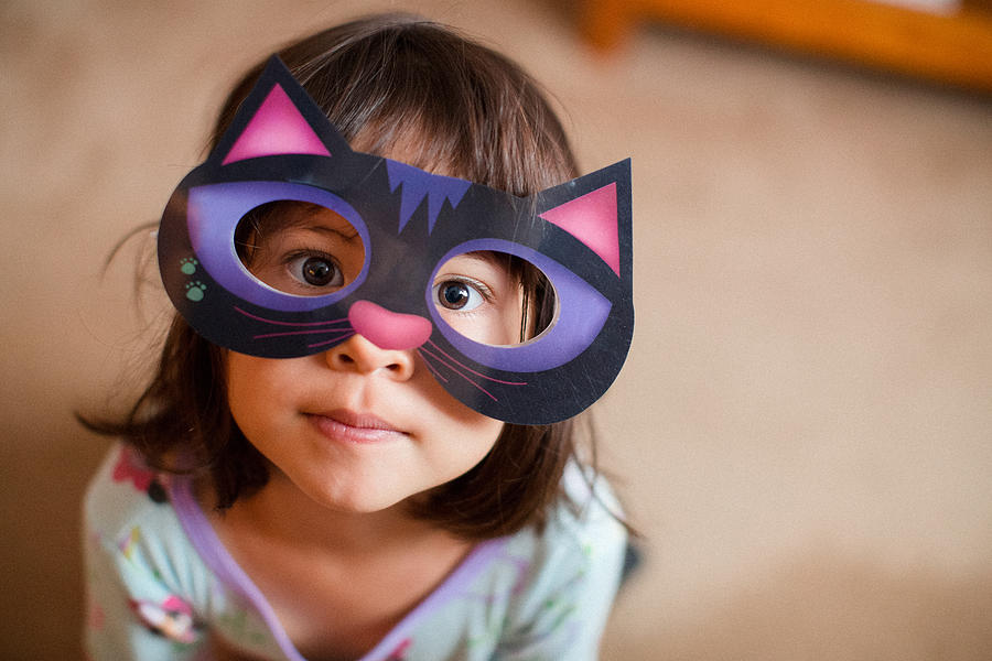 Girl wearing cat mask Photograph by Laura Olivas