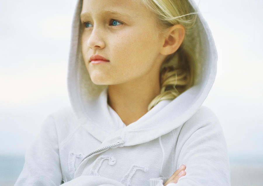 Girl wearing hooded sweatshirt Photograph by Sigrid Olsson
