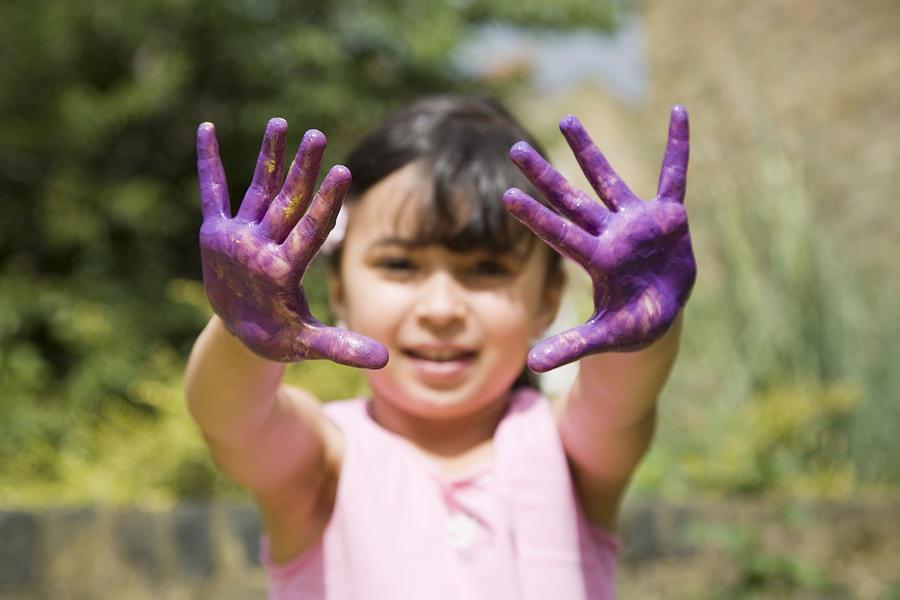 Girl with painted hands Photograph by Thomas Odulate