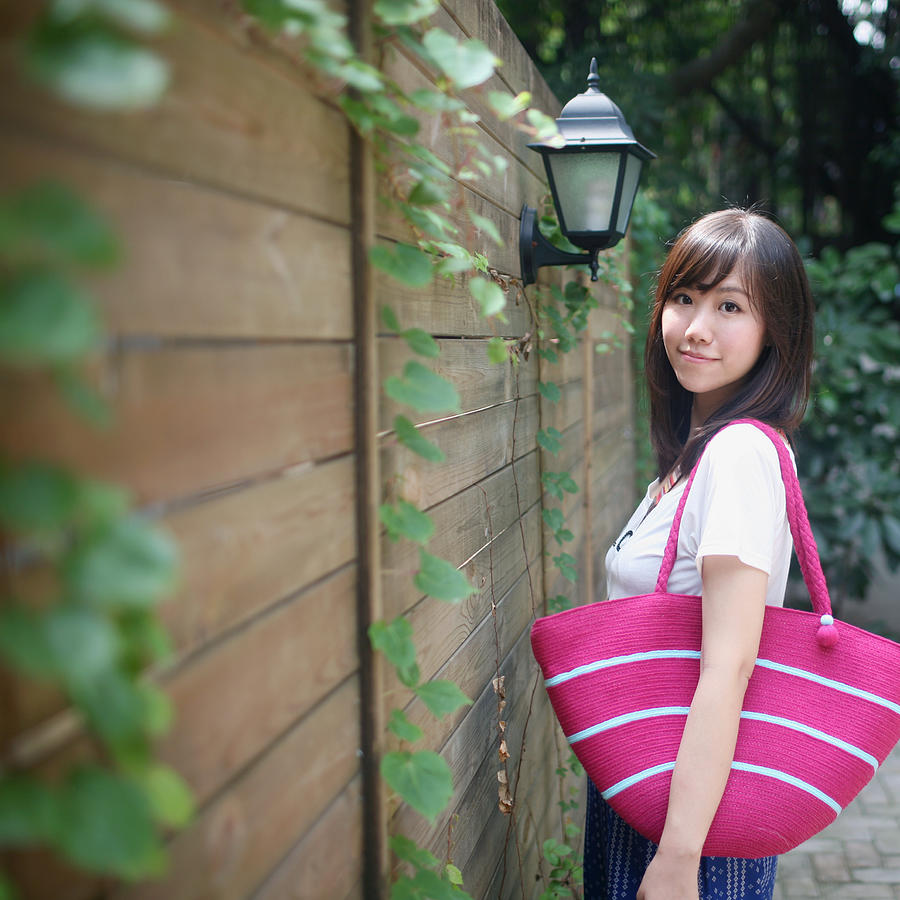 Girl with pink tote Photograph by Alfalfa126