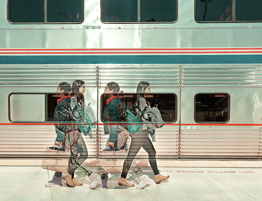 Girls at train stop Photograph by Hyuntae Kim