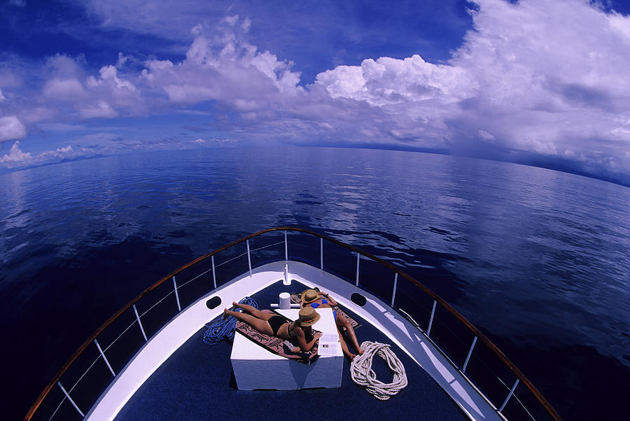 Girls Sunbathing On Boat Photograph by Tammy616