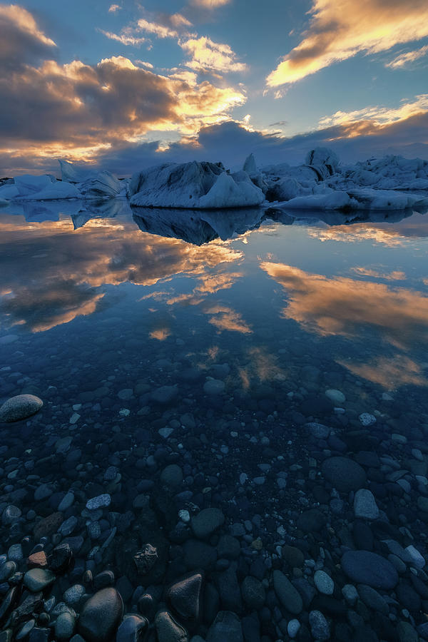 Glacial reflections at sunset Photograph by Murray Rudd