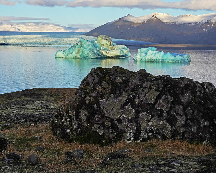 Glacier Lagoon Black Rock and Large Blue Iceberg Jokulsarlon Iceland Photograph by Toby McGuire