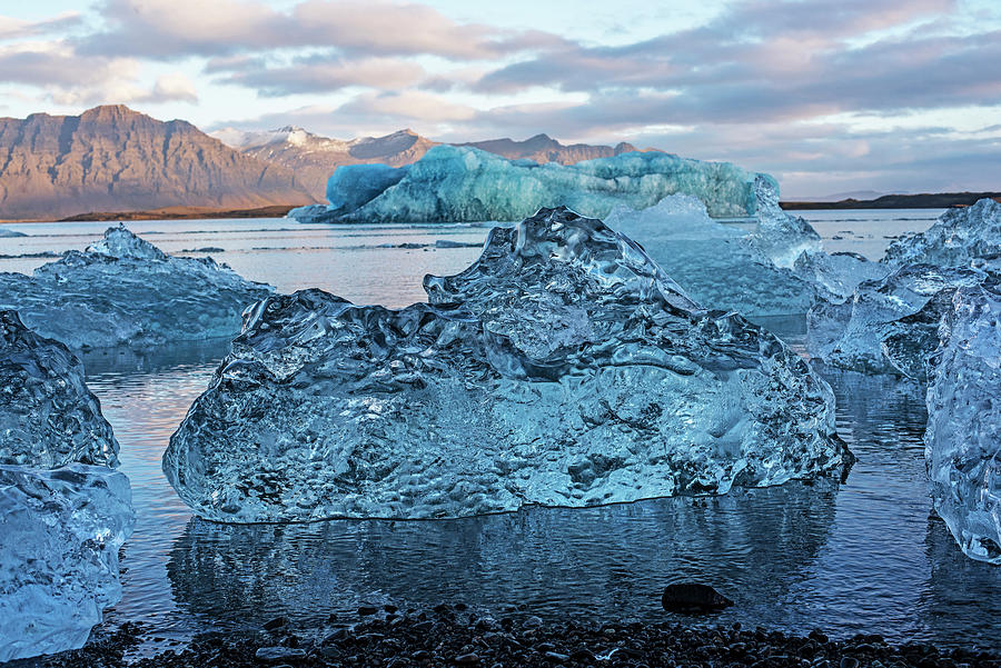 Glacier Lagoon Clear Ice Chunk and Large Blue Iceberg Jokulsarlon Iceland Photograph by Toby McGuire