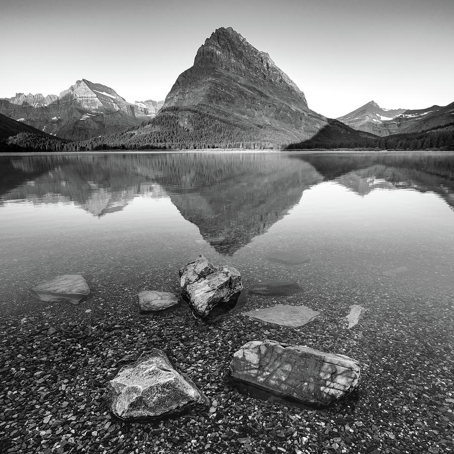 Black and white reflections at Glacier National Park Photograph by Robert Miller