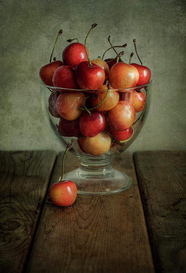 Glass of cherries Photograph by Jaroslaw Blaminsky