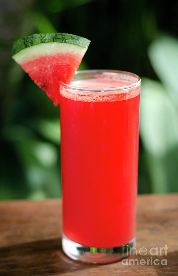 Glass Of Fresh Organic Watermelon Juice On Table Outdoors Photograph by JM Travel Photography