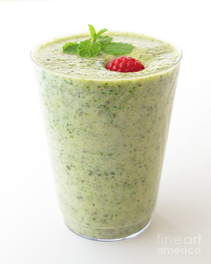 Fruit Photograph - Glass of green detox smoothie. by Hanna Tor