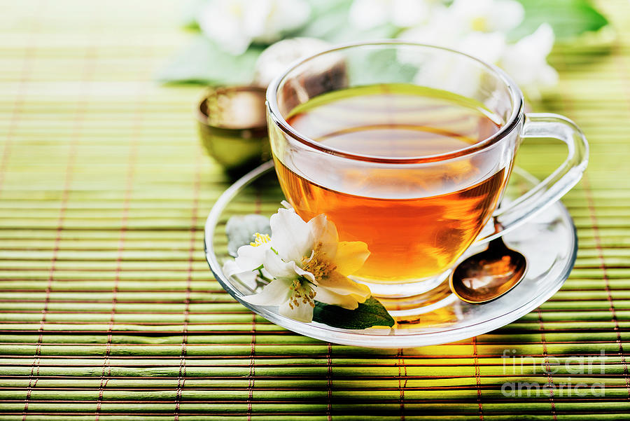 Glass Of Hot Herbal Tea On Bamboo Background Closeup. Teacup Wit Photograph