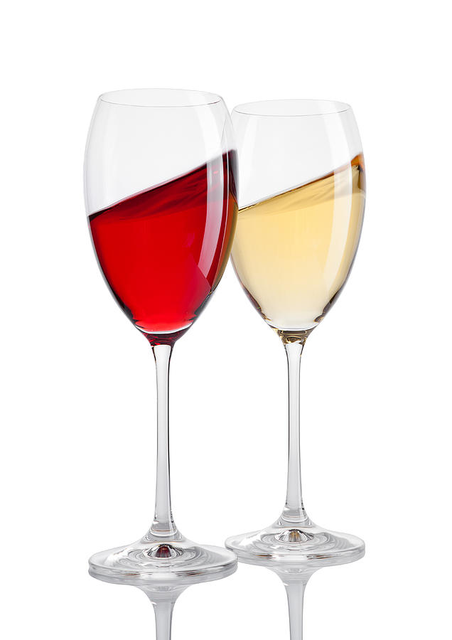 Glass of red and white wine in motion on white Photograph by DenisMArt