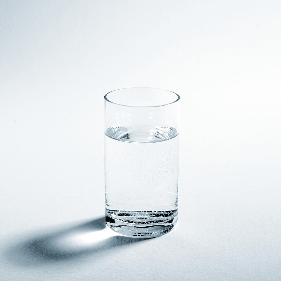 Glass of water Photograph by Laurent Hamels