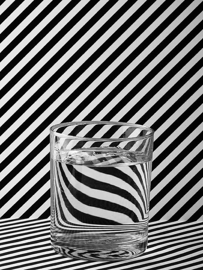 Glass of water Photograph by Paulo Goncalves