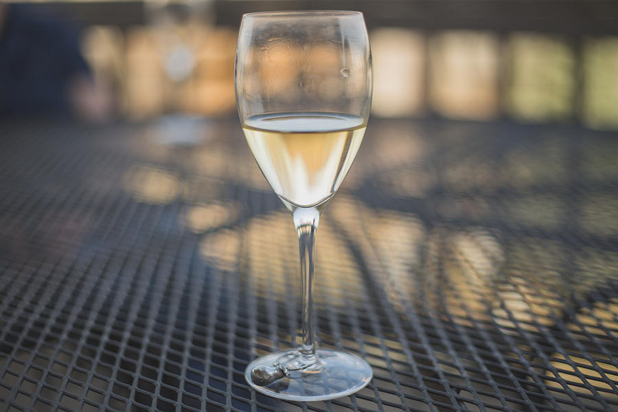 Glass of wine Photograph by Annie Otzen