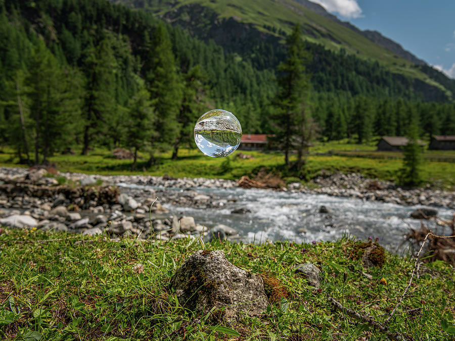 Glass Sphere Floating, River In Austrian Alps Photograph