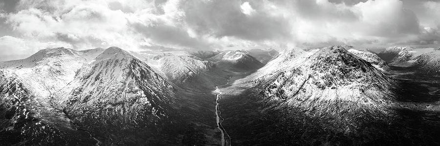 Glen Etive valley skyfall road in winter snow scottish highlands black and white Photograph by Sonny Ryse