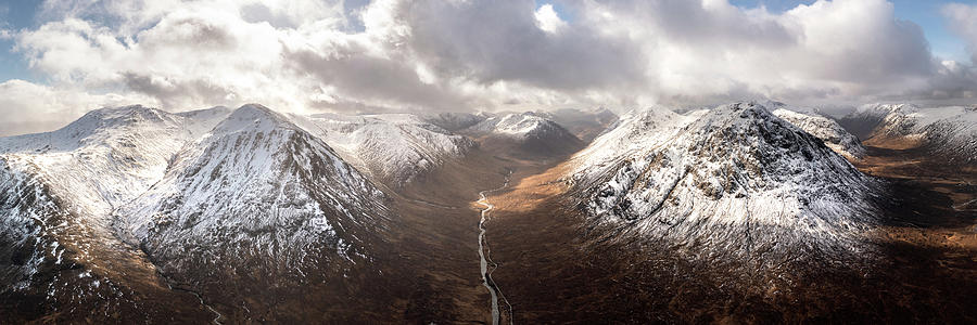 Glen Etive valley skyfall road in winter snow scottish highlands Photograph by Sonny Ryse