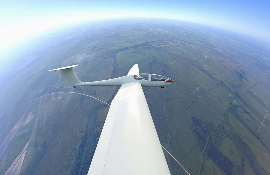 Glider airplane flying in sky Photograph by Colin Anderson Productions pty ltd
