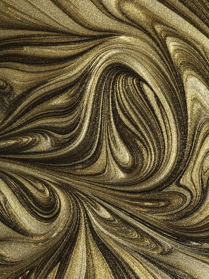 Glitter gold paint marbled swirl patterns Photograph by Jonathan Knowles