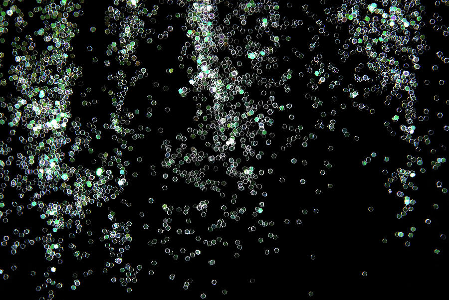 Glitter Sparkle On Black Background Photograph by Severija Kirilovaite