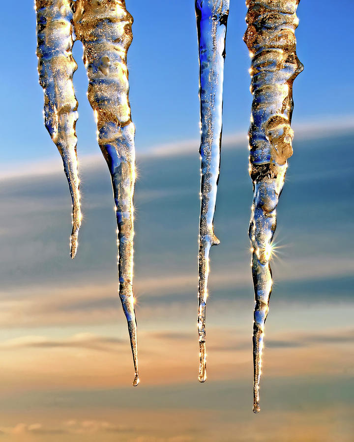 Glittering icicles at Sunrise Photograph by Carolyn Derstine