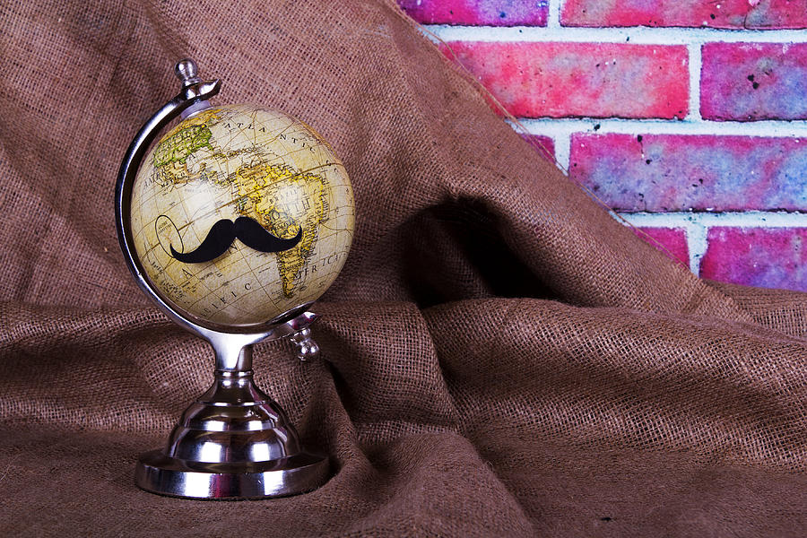 Globe with a black hipster mustache Photograph by Christopherhall