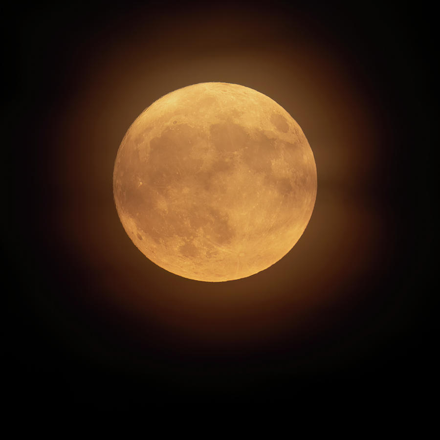 Glowing Full Buck Moon Photograph by Mark Harrington