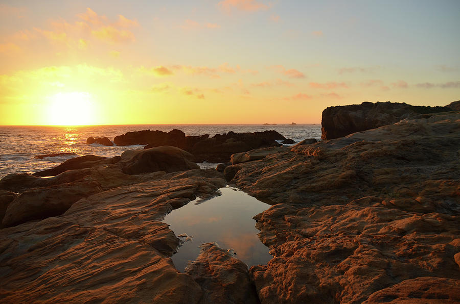 Glowing Sunset over the Tide Pools Photograph by Matthew DeGrushe