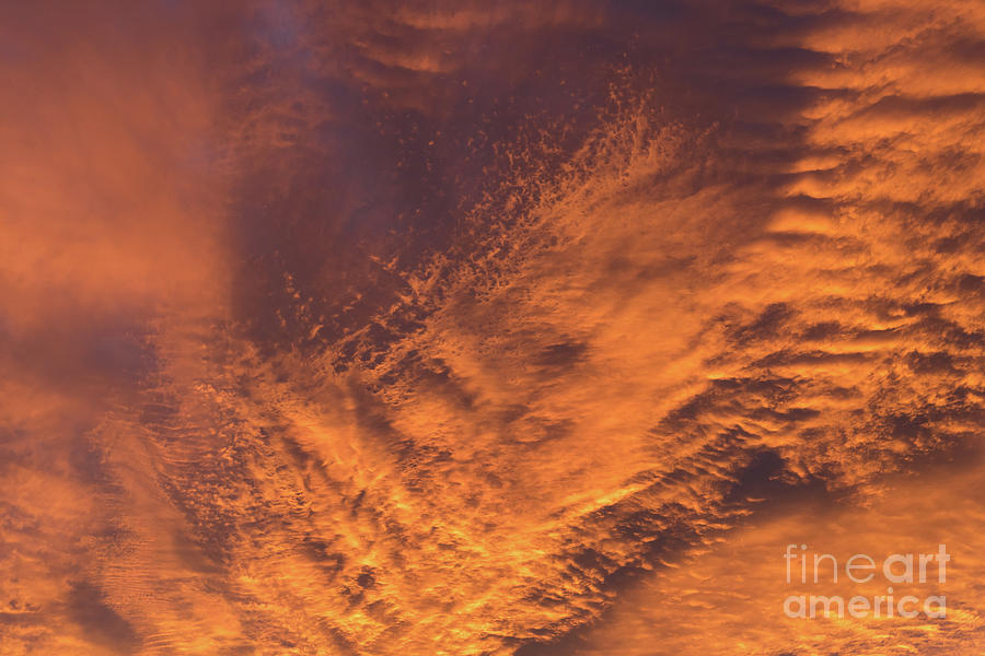Glowing sunset sky with deep orange clouds Photograph by Adriana Mueller
