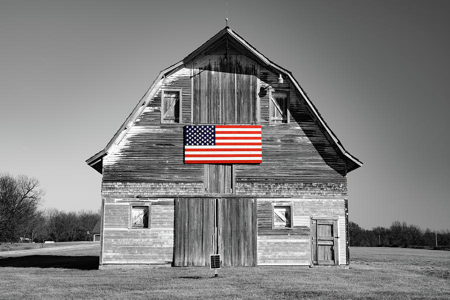 God Bless Flyover Country - Selective Color USA Flag And Vintage Barn Photograph by Gregory Ballos