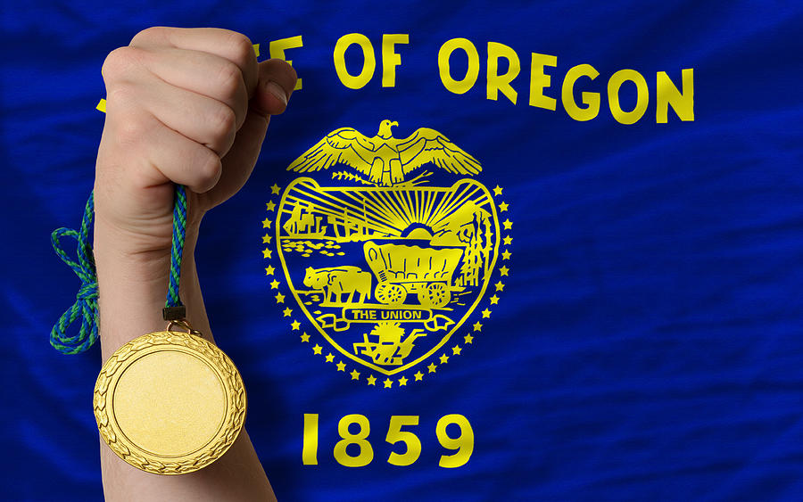 Gold medal for sport and  flag of oregon Photograph by Vepar5