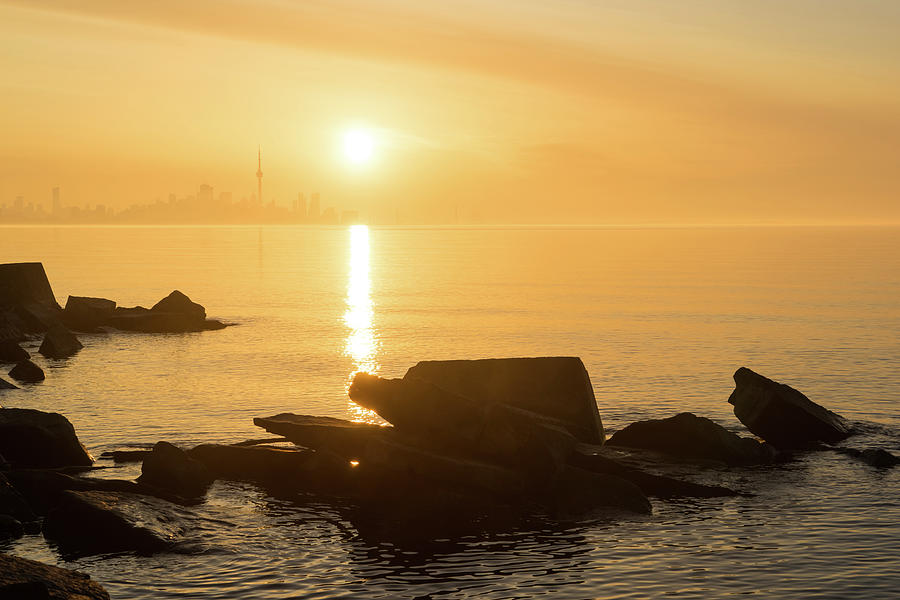 Gold Mist Sunrise - Toronto Skyline With Rough Rocks Photograph