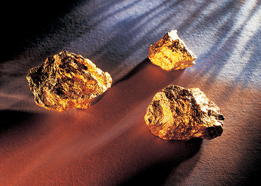Gold nuggets Photograph by Stockbyte