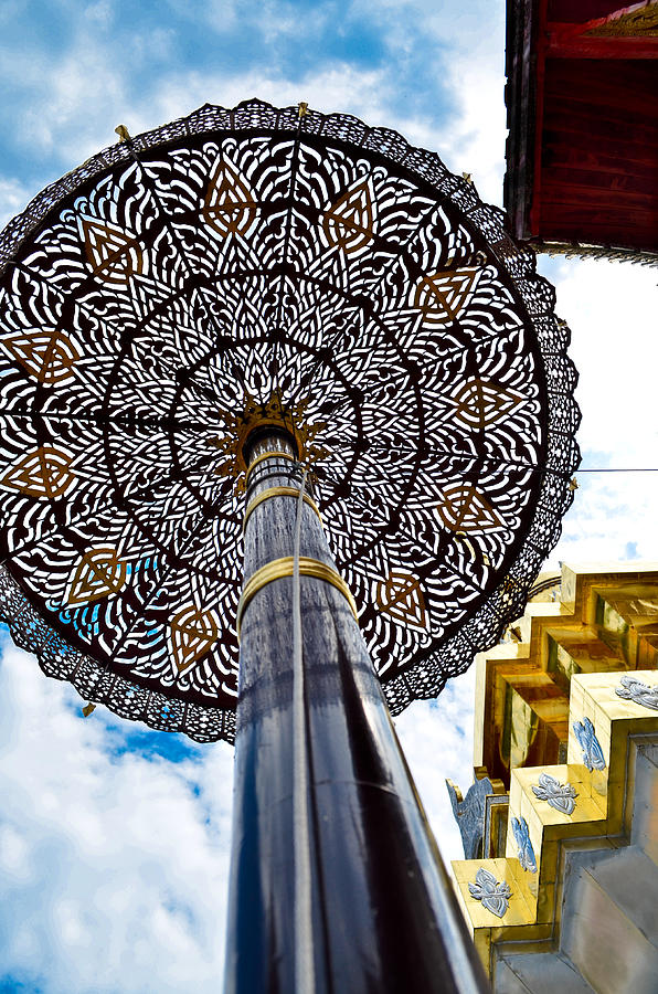 Gold tiered umbrella around pagoda temple chiangmai Thailand Photograph by Keerati1