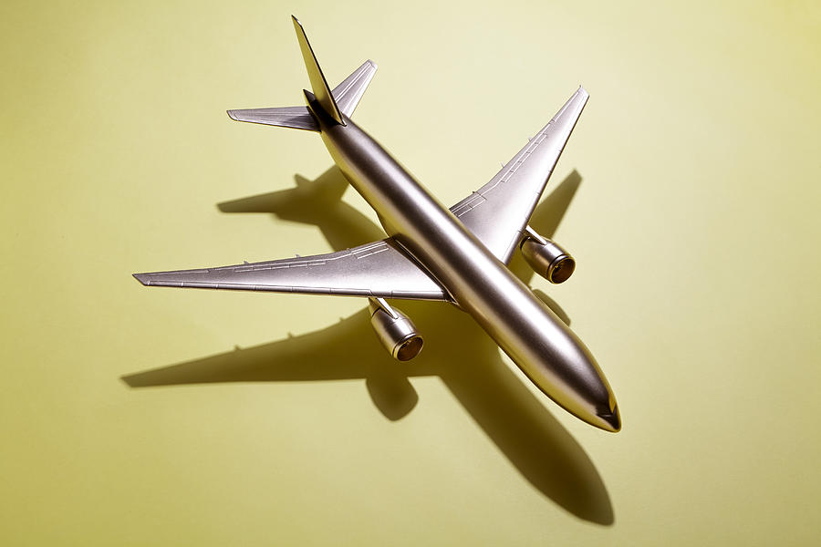 Golden Airplane Photograph by Joseph Clark