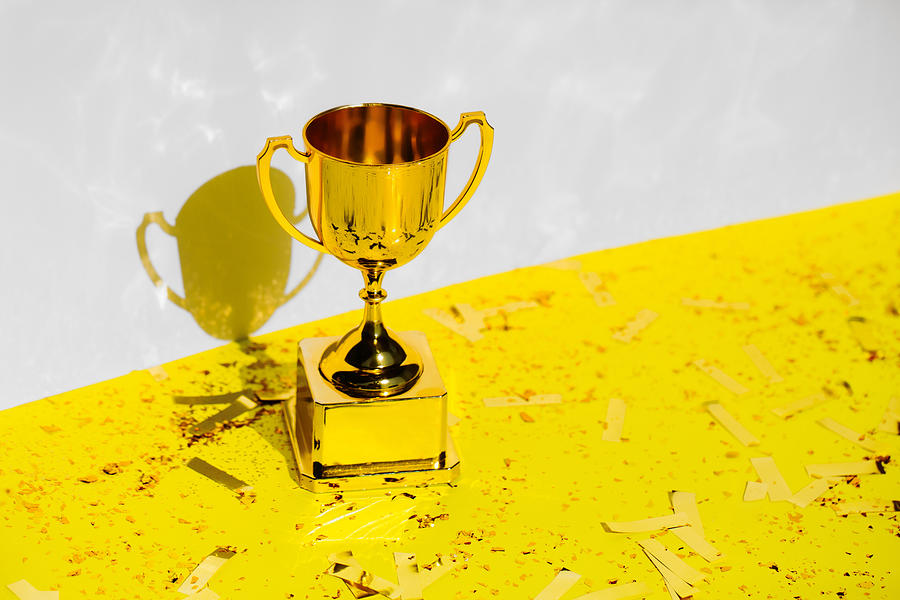Golden champions cup. Trendy colors of 2021 year Photograph by Anna Efetova
