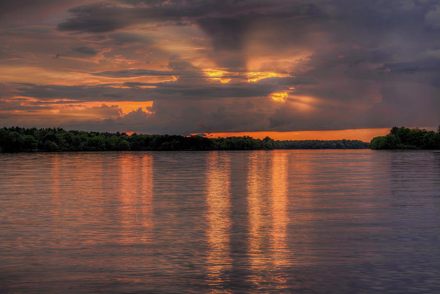 Golden Crepuscular Rays Over Lake Wausau Photograph by Dale Kauzlaric