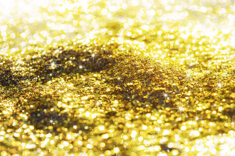 Golden glitter background Photograph by Ranasu