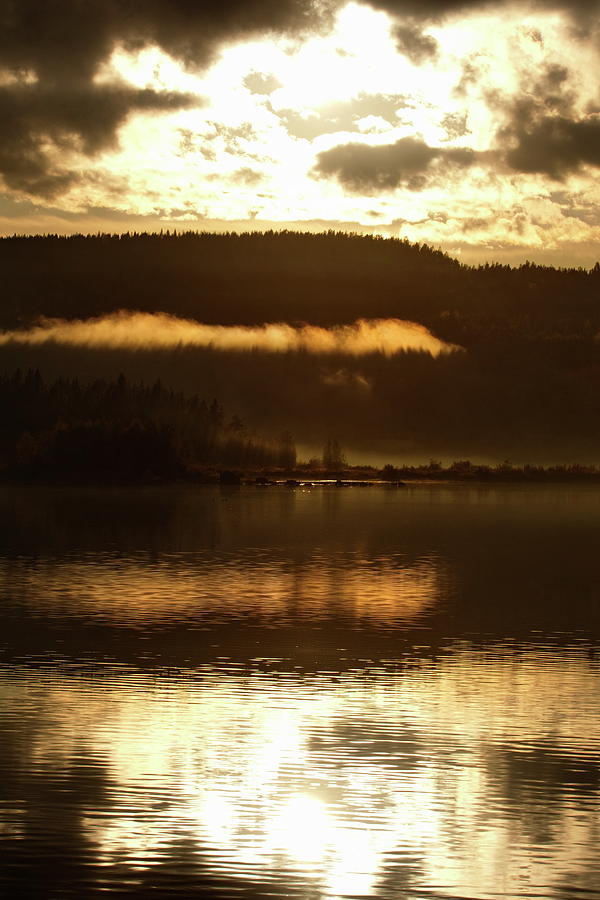 Golden glowing haze is reflected in a quiet forest lake Photograph by Ulrich Kunst And Bettina Scheidulin