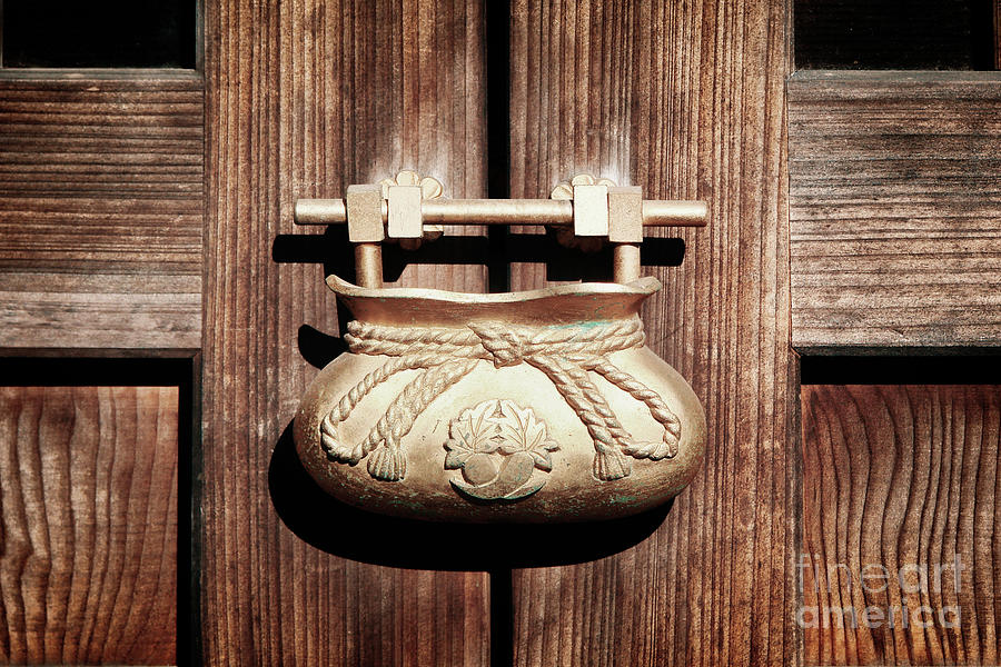Golden japanese lock Photograph by Delphimages Photo Creations