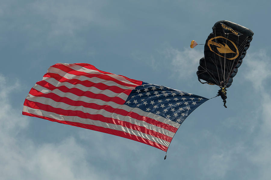 Golden Knights Skydiving Team with American Flag Photograph by Carolyn Hutchins
