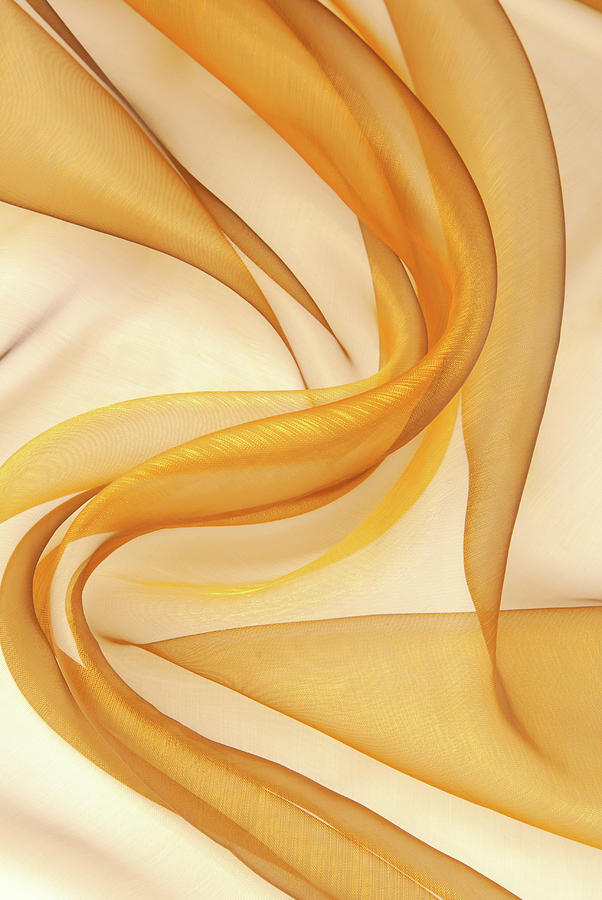 Golden Organza Fabric Wavy Texture Photograph by Severija Kirilovaite