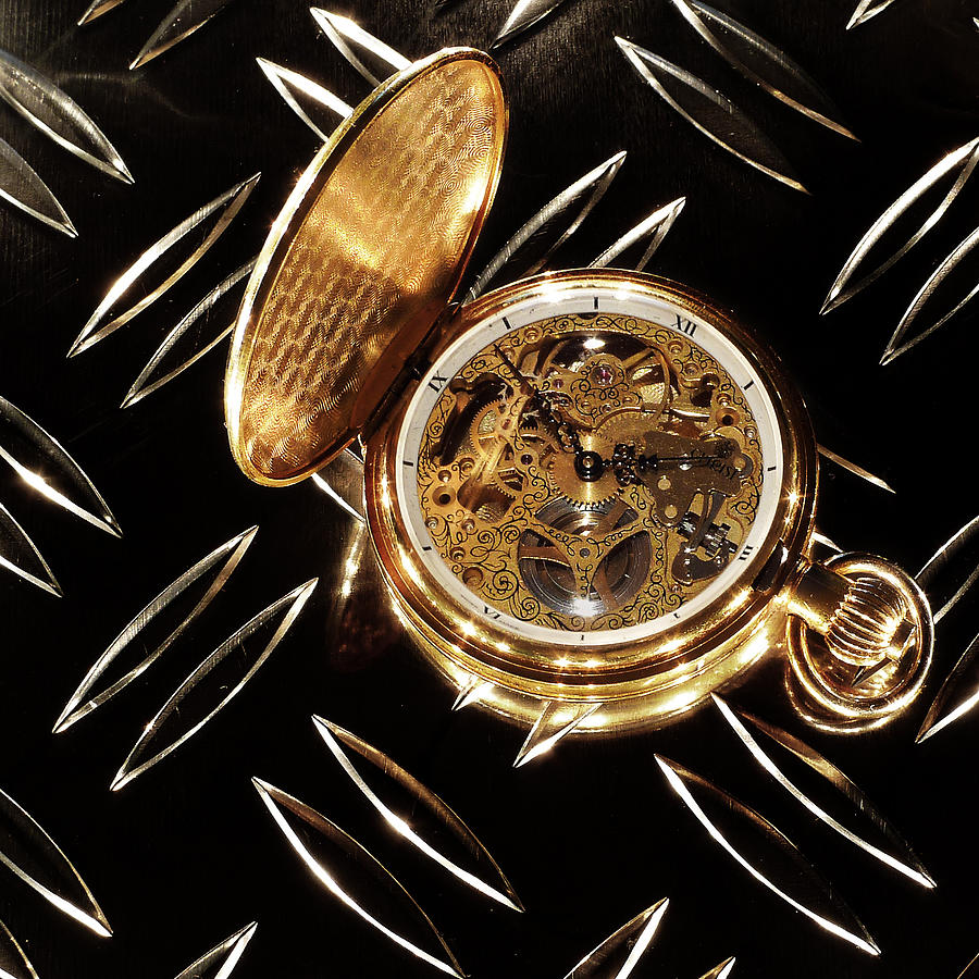 Golden pocket watch Photograph by Bernd Schunack