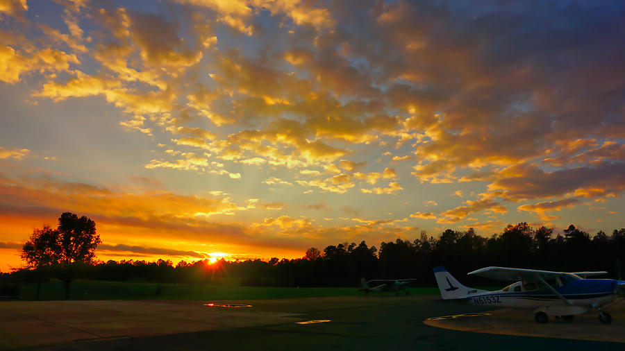 Golden Shimmer Sunset at JAARS Airport Photograph by Daniel Brinneman