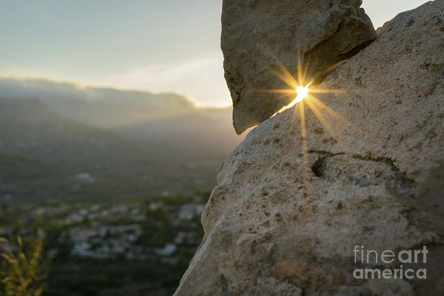 Golden sunlight and rock at sunset Photograph by Adriana Mueller