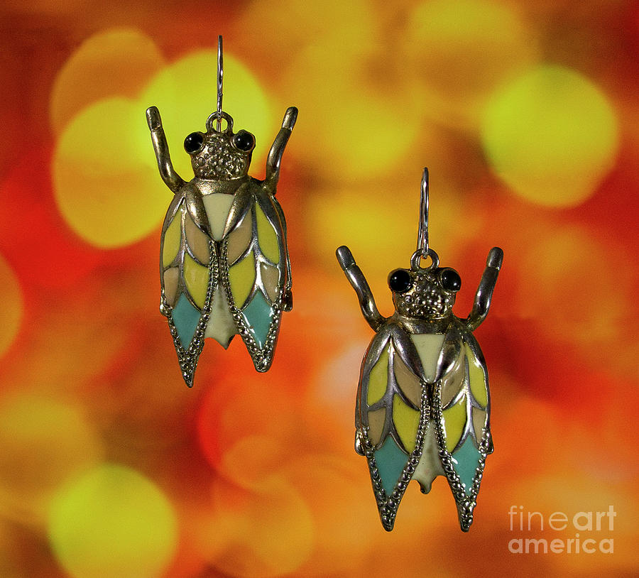 Golden Turquoise Yellow Enameled Metal Beetle Earrings Bokeh Background Photograph by Pablo Avanzini
