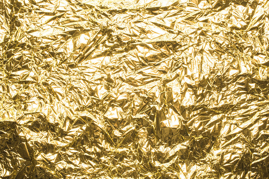 Golden winkled foil texture background Photograph by Katsumi Murouchi