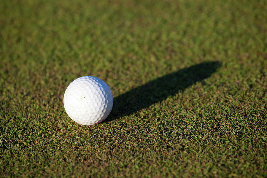 Golf Ball On Green Grass, Shadow Photograph