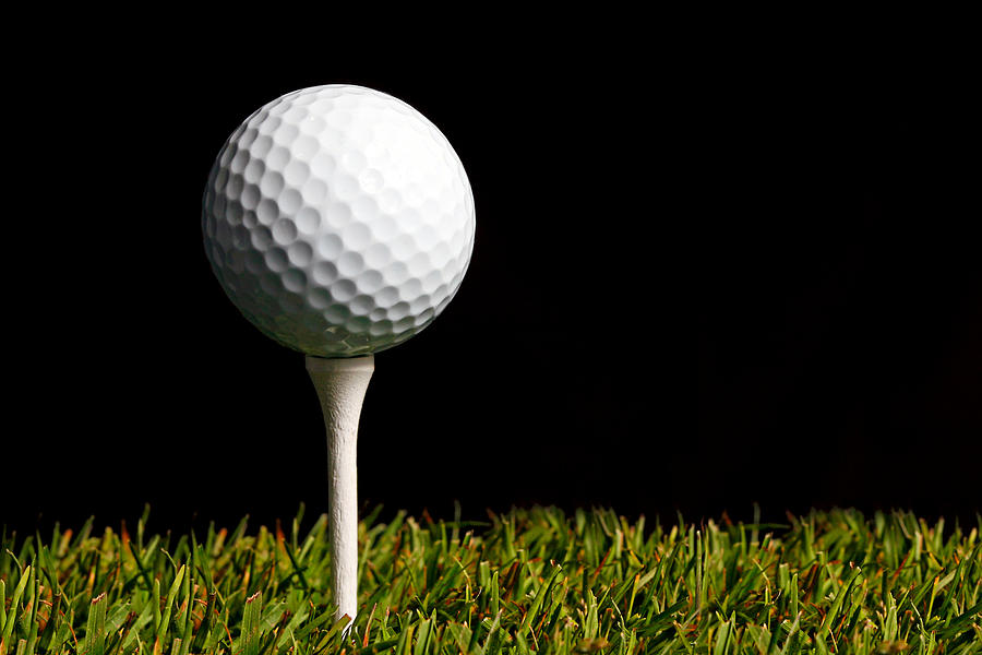 Golf ball on tee Photograph by Cappi Thompson