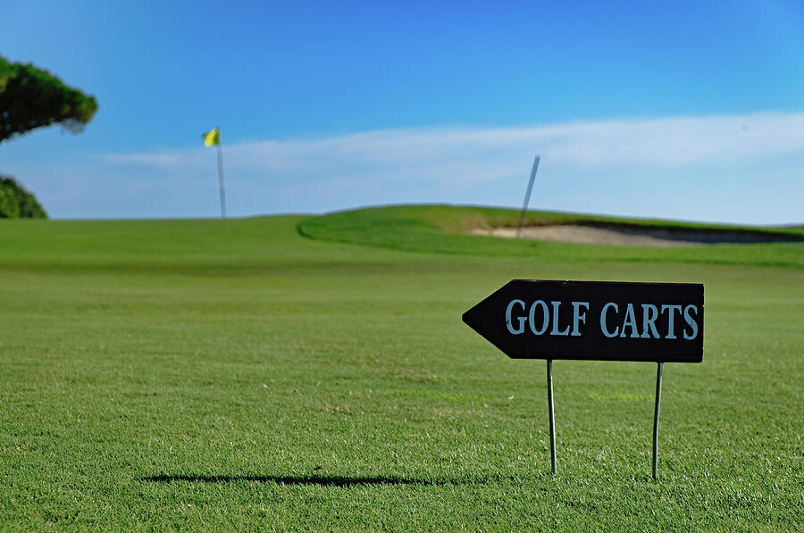 Golf Carts sign on a Golf Course Photograph by Angelo DeVal